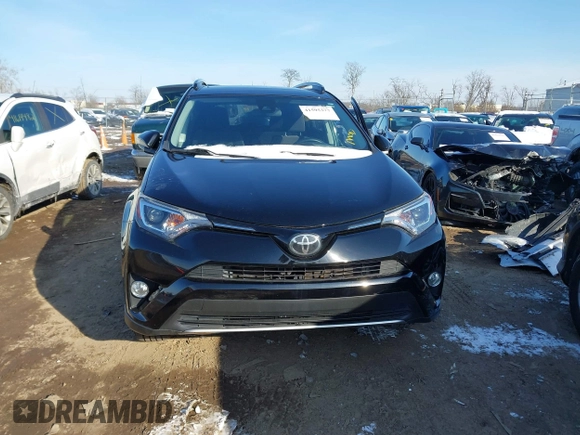2018 Toyota RAV4 XLE with VIN 2T3RFREV1JW808773, listed as a IAAI auction lot 41595377 with 109,309 mi miles. Bid and sale history available at carsss.com. Image 13.
