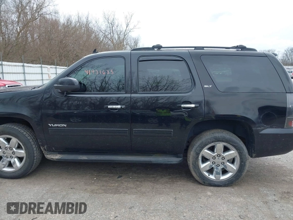 2011 GMC Yukon SLT with VIN 1GKS2CE01BR347675, listed as a IAAI auction lot 41931635 with 247,817 mi miles. Bid and sale history available at carsss.com. Image 14.