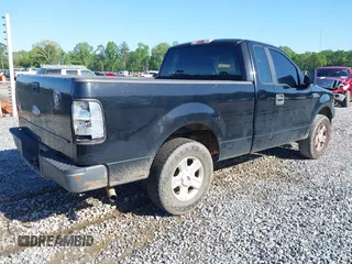 2007 Ford F-150 XL with VIN 1FTRF12297NA81619, listed as a IAAI auction lot 41855562 with 310,954 mi miles. Bid and sale history available at carsss.com. Image 4.
