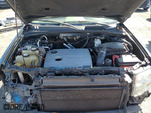 2009 Ford Escape Hybrid with VIN 1FMCU493X9KB03901, listed as a Copart auction lot 52353675 with 145,444 mi miles and Salvage title. Bid and sale history available at DreamBid. Image 12.