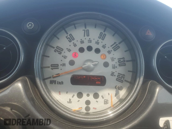 2005 MINI Hardtop S with VIN WMWRE33415TD90833, listed as a Copart auction lot 61238165 with 174,647 mi miles and Salvage title. Bid and sale history available at DreamBid. Image 9.