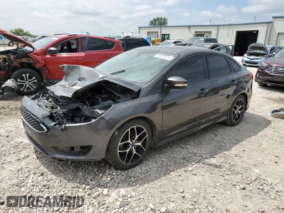 2015 Ford Focus SE z VIN 1FADP3F24FL357329, wystawiony jako Copart lot #59976215 z przebiegiem 182 407 mil mil oraz Czysty tytuł • Clean title. Historia ofert i sprzedaży dostępna na DreamBid. Obrazek 1.