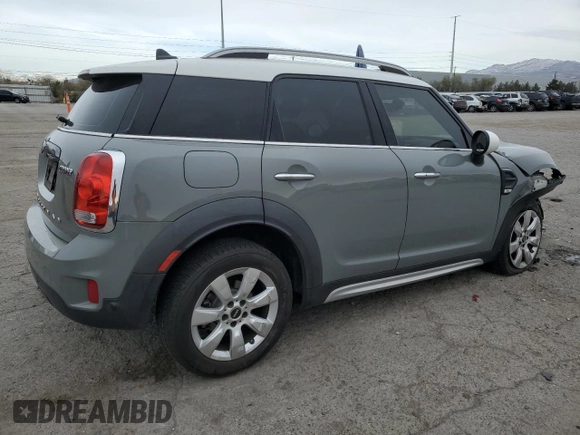 2017 MINI Countryman Cooper with VIN WMZYS7C31H3E06457, listed as a Copart auction lot 49351315 with 77,461 mi miles and Salvage title. Bid and sale history available at DreamBid. Image 3.