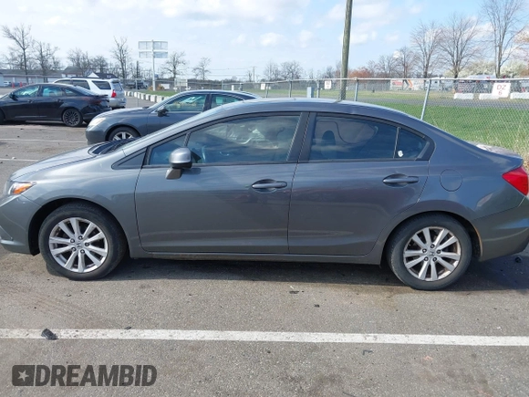 2012 Honda Civic EX-L with VIN 2HGFB2F94CH307646, listed as a IAAI auction lot 42006923 with 260,917 mi miles and . Bid and sale history available at DreamBid. Image 14.