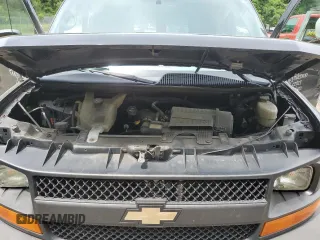 2015 Chevrolet Express Passenger LS with VIN 1GAWGPFG0F1141701, listed as a Copart auction lot 62818685 with 63,219 mi miles and Salvage title. Bid and sale history available at DreamBid. Image 12.
