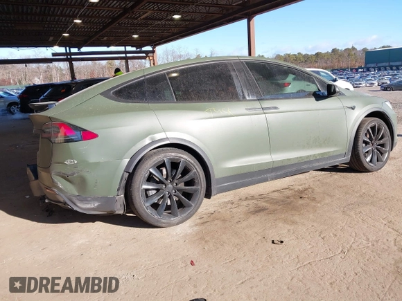 2020 Tesla Model X Long Range with VIN 5YJXCDE24LF272242, listed as a IAAI auction lot 41275226 with 103,731 mi miles. Bid and sale history available at carsss.com. Image 4.