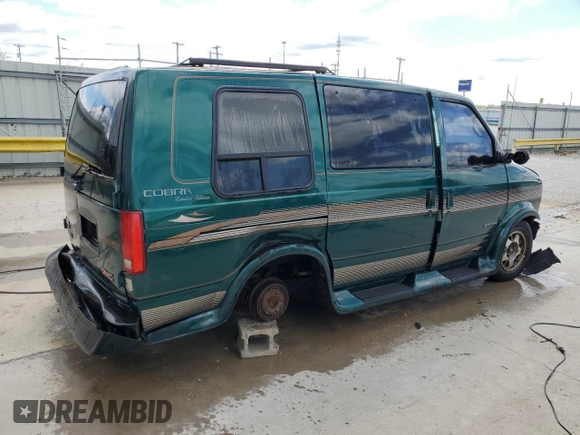 1998 GMC Safari z VIN 1GDDM19WXWB540497, wystawiony jako Copart lot #50780655 z przebiegiem 115 575 mil mil oraz Nie do naprawy. Historia ofert i sprzedaży dostępna na DreamBid. Obrazek 3.