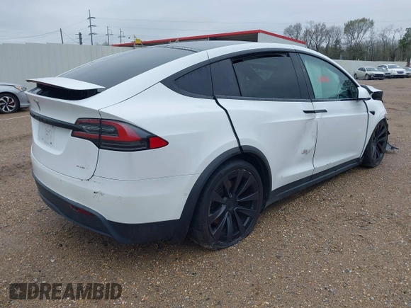 2022 Tesla Model X Plaid with VIN 7SAXCBE68NF333394, listed as a IAAI auction lot 41615086 with Not Provided miles and . Bid and sale history available at DreamBid. Image 4.