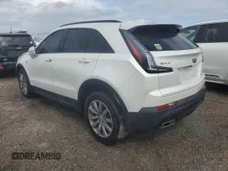 2022 Cadillac XT4 FWD Sport z VIN 1GYFZER44NF118862, wystawiony jako Copart lot #55231775 z przebiegiem 14 983 mil mil oraz Nie do naprawy. Historia ofert i sprzedaży dostępna na DreamBid. Obrazek 2.