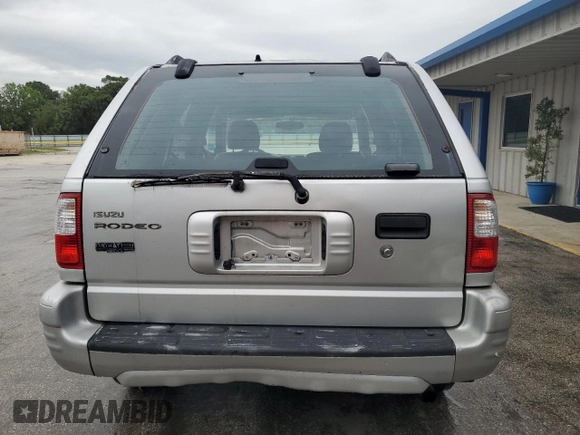 2001 Isuzu Rodeo S with VIN 4S2CK58W914309610, listed as a Copart auction lot 47966745 with Not Provided miles and Clean Title. Bid and sale history available at DreamBid. Image 6.