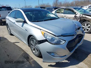 2012 Hyundai Sonata Hybrid z VIN KMHEC4A42CA054710, wystawiony jako IAAI lot #41871775 z przebiegiem Nie podano mil oraz . Historia ofert i sprzedaży dostępna na DreamBid. Obrazek 1.
