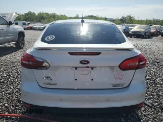 2016 Ford Focus Titanium z VIN 1FADP3J25GL201003, wystawiony jako Copart lot #53799745 z przebiegiem 194 055 mil mil oraz Szkoda całkowita • Salvage title. Historia ofert i sprzedaży dostępna na DreamBid. Obrazek 6.