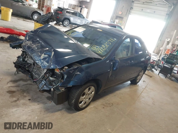 2004 Kia Spectra LX with VIN KNAFE121145012249, listed as a IAAI auction lot 42032571 with 146,748 mi miles. Bid and sale history available at carsss.com. Image 2.