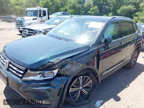 2018 Volkswagen Tiguan SEL with VIN 3VV2B7AX9JM058518, listed as a IAAI auction lot 42558129 with 82,807 mi miles and . Bid and sale history available at DreamBid. Image 17.