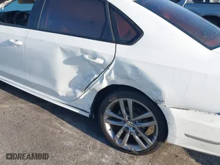 2018 Volkswagen Passat 2.0T S with VIN 1VWAA7A35JC009020, listed as a IAAI auction lot 41955626 with 99,900 mi miles. Bid and sale history available at carsss.com. Image 6.
