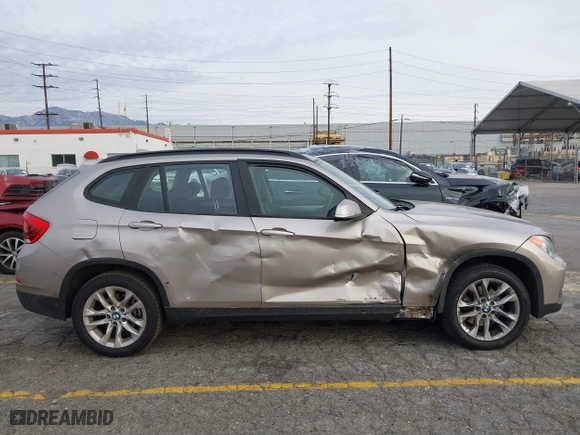 2015 BMW X1 xDrive28i with VIN WBAVL1C55FVY41749, listed as a IAAI auction lot 40977221 with 120,924 mi miles. Bid and sale history available at carsss.com. Image 13.