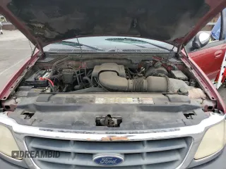 2001 Ford F-150 XLT with VIN 1FTRW07WX1KE51166, listed as a Copart auction lot 60164025 with 157,035 mi miles and Salvage title. Bid and sale history available at DreamBid. Image 11.