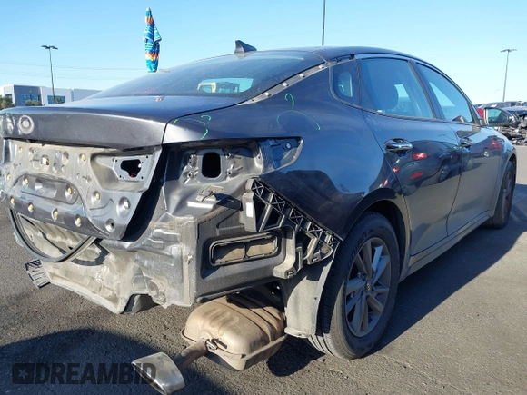 2019 Kia Optima LX with VIN 5XXGT4L36KG292905, listed as a IAAI auction lot 42011723 with 113,553 mi miles. Bid and sale history available at carsss.com. Image 4.