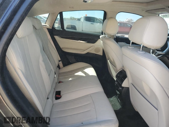 2016 BMW X6 sDrive35i with VIN 5UXKU0C5XG0F92975, listed as a Copart auction lot 74890804 with 64,231 mi miles and Salvage Title. Bid and sale history available at carsss.com. Image 12.