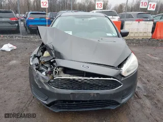 2018 Ford Focus SE with VIN 1FADP3F23JL298265, listed as a IAAI auction lot 42005754 with 134,721 mi miles. Bid and sale history available at carsss.com. Image 13.