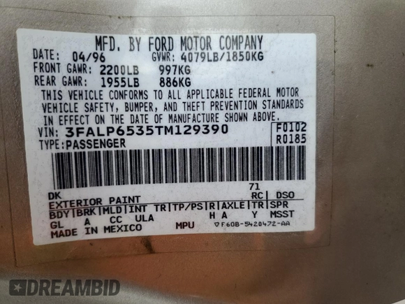 1996 Ford Contour with VIN 3FALP6535TM129390, listed as a Copart auction lot 73338064 with 87,588 mi miles and Salvage title. Bid and sale history available at DreamBid. Image 12.
