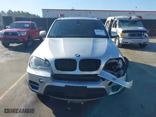 2011 BMW X5 35i with VIN 5UXZV4C5XBL412661, listed as a IAAI auction lot 41810470 with 168,470 mi miles. Bid and sale history available at carsss.com. Image 11.