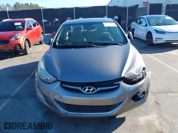 2013 Hyundai Elantra GLS z VIN 5NPDH4AE7DH174538, wystawiony jako IAAI lot #41428026 z przebiegiem 158 066 mil mil oraz . Historia ofert i sprzedaży dostępna na DreamBid. Obrazek 12.
