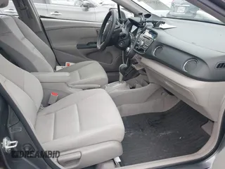 2011 Honda Insight EX z VIN JHMZE2H72BS001792, wystawiony jako IAAI lot #42207415 z przebiegiem 131 792 mil mil oraz . Historia ofert i sprzedaży dostępna na DreamBid. Obrazek 5.