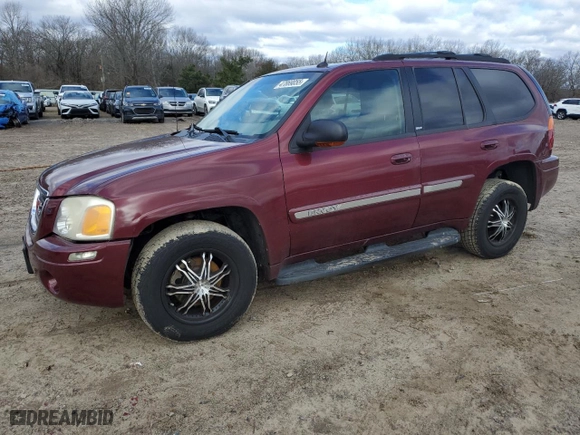 2004 GMC Envoy SLE with VIN 1GKDS13S742231927, listed as a Copart auction lot 47869055 with 79,048 mi miles and Salvage Title. Bid and sale history available at carsss.com. Image 1.