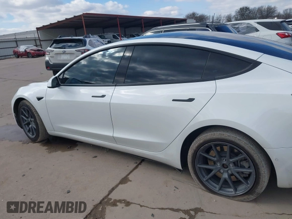 2021 Tesla Model 3 Long Range with VIN 5YJ3E1EB9MF059554, listed as a IAAI auction lot 41231520 with 63,696 mi miles and . Bid and sale history available at DreamBid. Image 13.