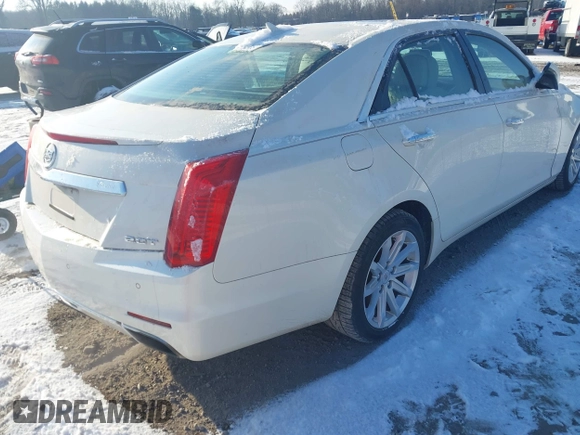 2014 Cadillac CTS Luxury RWD with VIN 1G6AR5SXXE0141931, listed as a IAAI auction lot 41352385 with 162,612 mi miles. Bid and sale history available at carsss.com. Image 4.