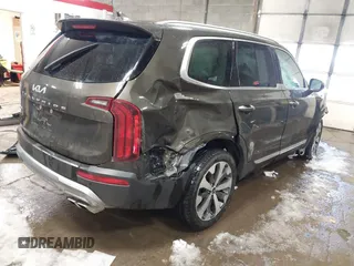 2022 Kia Telluride S with VIN 5XYP6DHC4NG200609, listed as a IAAI auction lot 41595189 with 54,189 mi miles and . Bid and sale history available at DreamBid. Image 4.