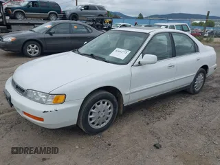 1997 Honda Accord with VIN 1HGCD5555VA127980, listed as a IAAI auction lot 42412772 with 235,367 mi miles and . Bid and sale history available at DreamBid. Image 2.