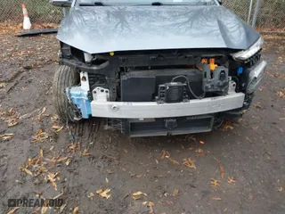 2021 Hyundai Kona Electric Ultimate with VIN KM8K53AG0MU108118, listed as a IAAI auction lot 41247324 with 21,679 mi miles. Bid and sale history available at carsss.com. Image 6.