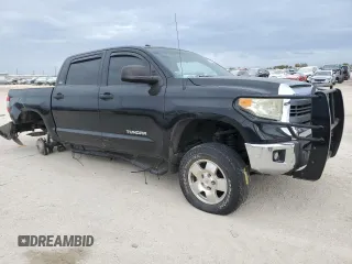2014 Toyota Tundra 4WD Truck with VIN 5TFDM5F14EX051518, listed as a Copart auction lot 76700424 with 157,451 mi miles and Salvage Title. Bid and sale history available at carsss.com. Image 4.