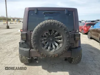 2014 Jeep Wrangler Unlimited Sahara with VIN 1C4BJWEG1EL196129, listed as a Copart auction lot 53700115 with 140,998 mi miles and Clean Title. Bid and sale history available at carsss.com. Image 6.