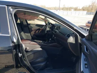 2016 Mazda 6 i Grand Touring with VIN JM1GJ1W50G1478699, listed as a IAAI auction lot 41711211 with 208,720 mi miles and . Bid and sale history available at DreamBid. Image 5.