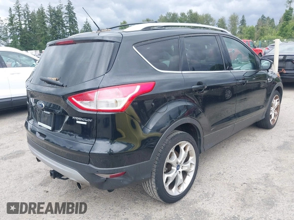 2013 Ford Escape Titanium with VIN 1FMCU9J98DUB02238, listed as a IAAI auction lot 42609782 with 168,574 mi miles and . Bid and sale history available at DreamBid. Image 4.