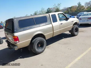 1999 Ford Ranger XL with VIN 1FTYR14X9XTA59675, listed as a IAAI auction lot 41861165 with 208,928 mi miles. Bid and sale history available at carsss.com. Image 4.