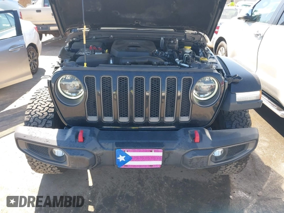 2019 Jeep Wrangler Unlimited Rubicon with VIN 1C4HJXFN1KW679028, listed as a IAAI auction lot 41654887 with 32,247 mi miles and . Bid and sale history available at DreamBid. Image 10.