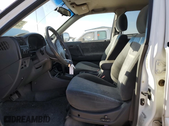 2001 Isuzu Rodeo S z VIN 4S2DM58W114306215, wystawiony jako Copart lot #85287914 z przebiegiem 157 844 mil mil oraz Szkoda całkowita • Salvage title. Historia ofert i sprzedaży dostępna na DreamBid. Obrazek 7.