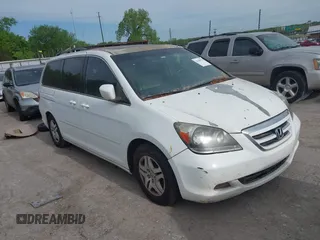 2007 Honda Odyssey EX-L with VIN 5FNRL38787B051582, listed as a IAAI auction lot 42104718 with 193,630 mi miles and . Bid and sale history available at DreamBid. Image 1.