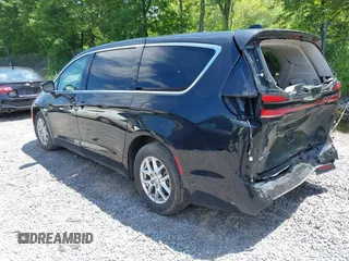 2023 Chrysler Pacifica Touring L with VIN 2C4RC1BG2PR534194, listed as a IAAI auction lot 42613934 with 69,896 mi miles and . Bid and sale history available at DreamBid. Image 3.