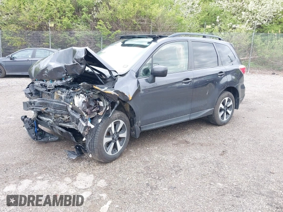 2018 Subaru Forester Premium with VIN JF2SJAEC7JH574341, listed as a IAAI auction lot 42021599 with 58,000 mi miles and . Bid and sale history available at DreamBid. Image 2.