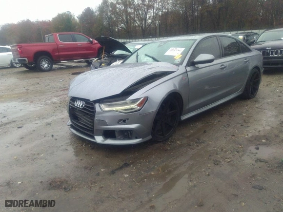 2016 Audi A6 3.0T Premium Plus with VIN WAUFGAFC6GN177739, listed as a IAAI auction lot 41013262 with 89,865 mi miles. Bid and sale history available at carsss.com. Image 2.