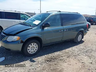 2005 Chrysler Town & Country LX with VIN 2C4GP44R75R267644, listed as a IAAI auction lot 42122611 with 107,802 mi miles and . Bid and sale history available at DreamBid. Image 2.