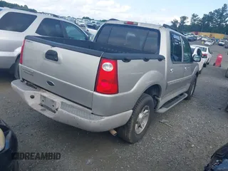 2003 Ford Explorer Sport Trac XLS z VIN 1FMZU67E63UC48939, wystawiony jako IAAI lot #42526151 z przebiegiem 221 402 mil mil oraz . Historia ofert i sprzedaży dostępna na DreamBid. Obrazek 4.