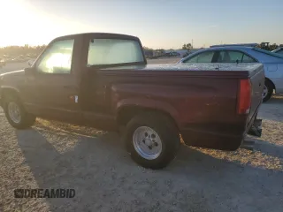 1989 GMC Sierra 1500 with VIN 1GTDC14HXKZ548889, listed as a Copart auction lot 74876684 with 205,365 mi miles and Salvage Title. Bid and sale history available at DreamBid. Image 2.