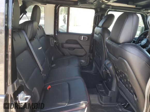 2023 Jeep Wrangler Rubicon z VIN 1C4HJXFN2PW617435, wystawiony jako Copart lot #75409114 z przebiegiem 12 185 mil mil oraz Szkoda całkowita • Salvage title. Historia ofert i sprzedaży dostępna na DreamBid. Obrazek 11.