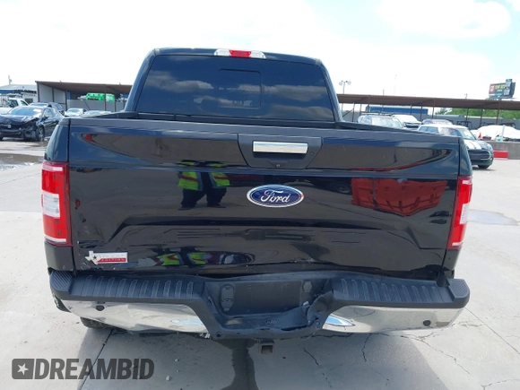 2019 Ford F-150 XL with VIN 1FTEW1E59KKE90346, listed as a IAAI auction lot 42188308 with 130,992 mi miles and . Bid and sale history available at DreamBid. Image 6.